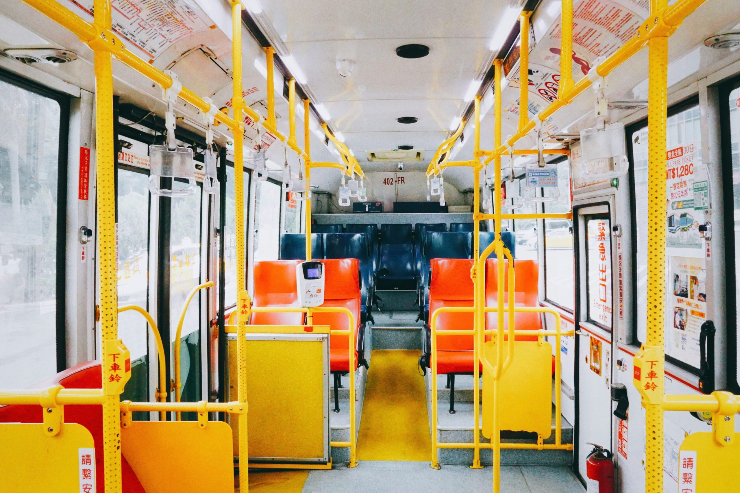 Passenger selecting ideal seat near window overlooking landscape