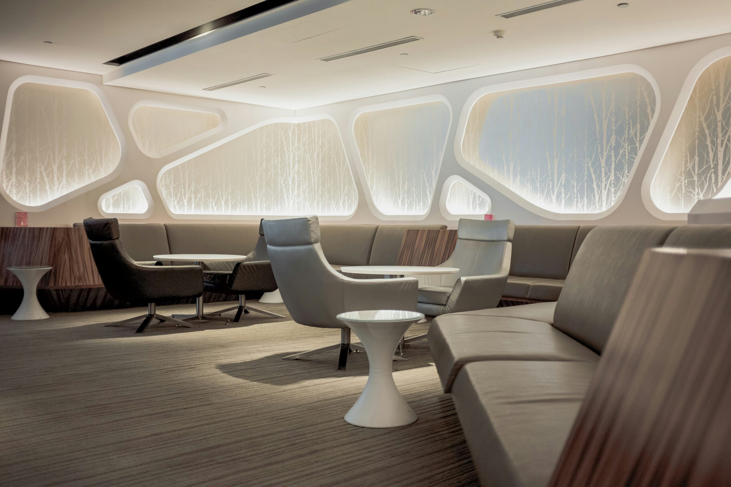 Luxury bus interior showcasing spacious first-class seating arrangements