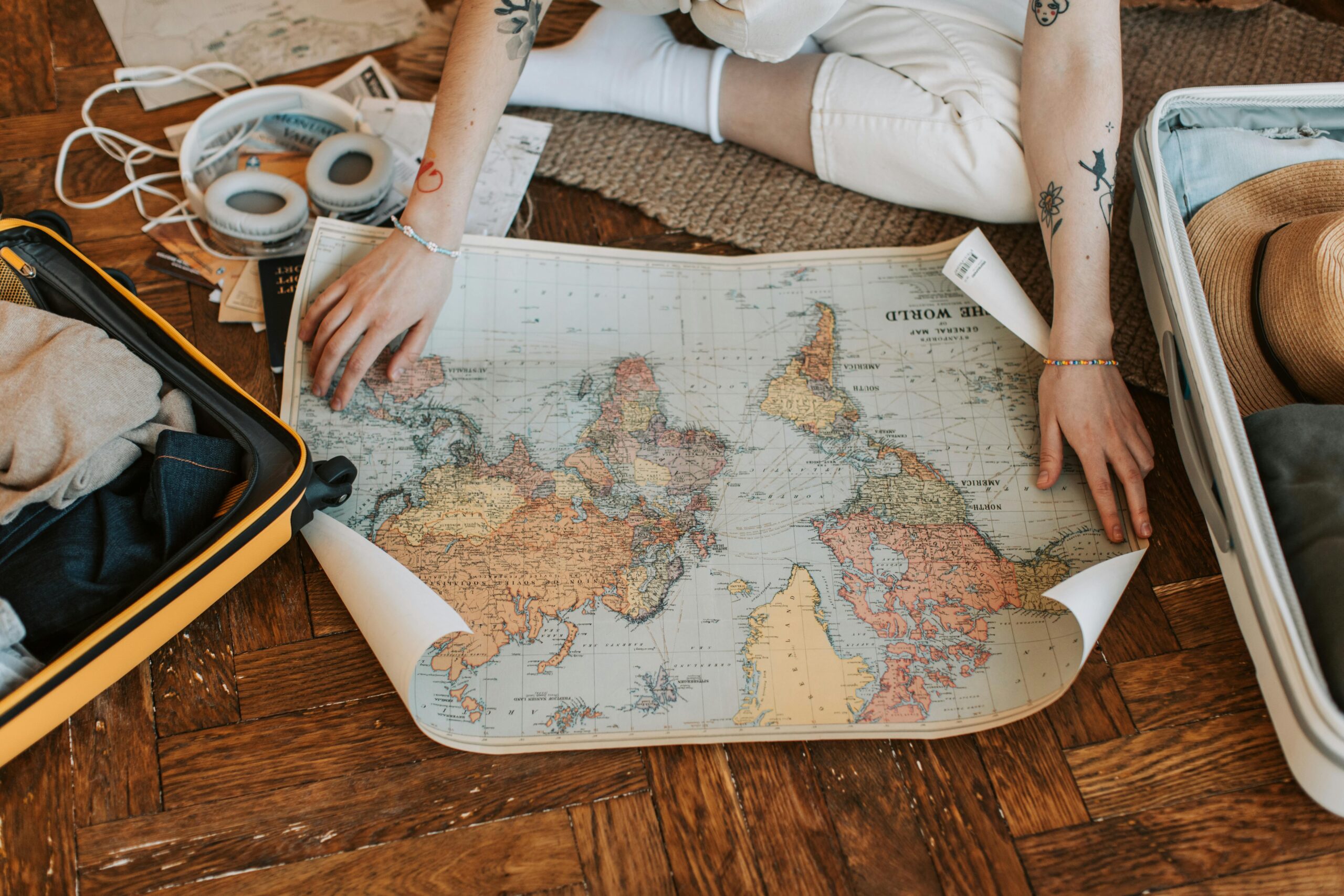 Person discussing travel itinerary with agent