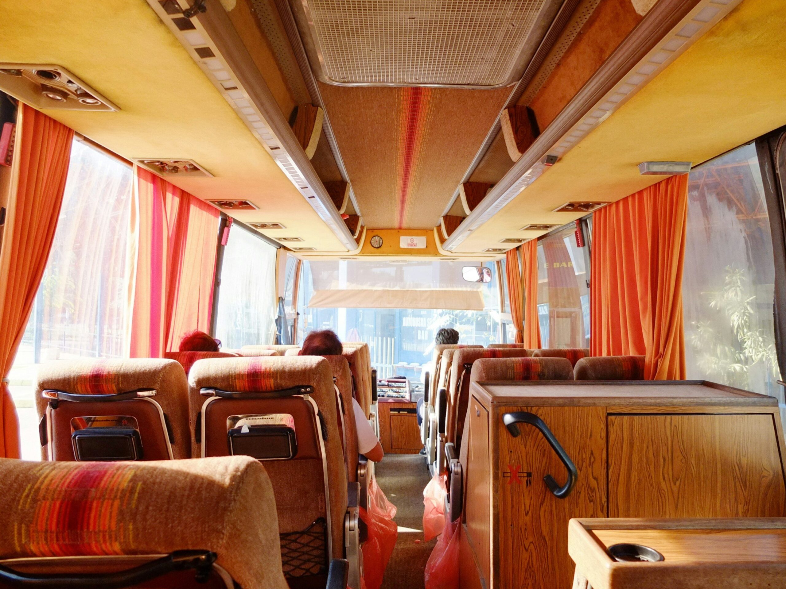 Family enjoying luxurious amenities aboard a first-class bus