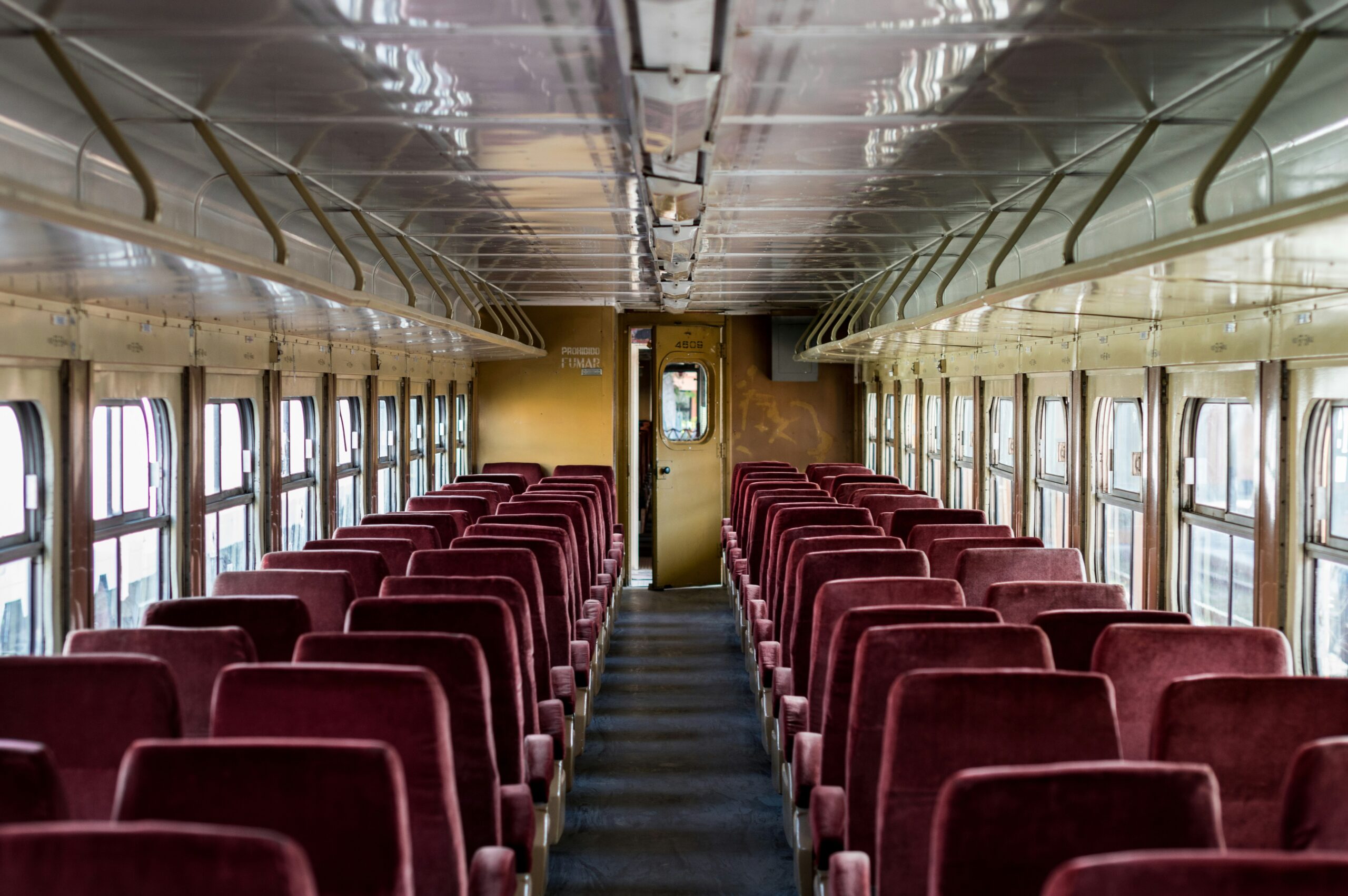 Luxurious interior of a high-end touring bus equipped with plush seating and modern technology.