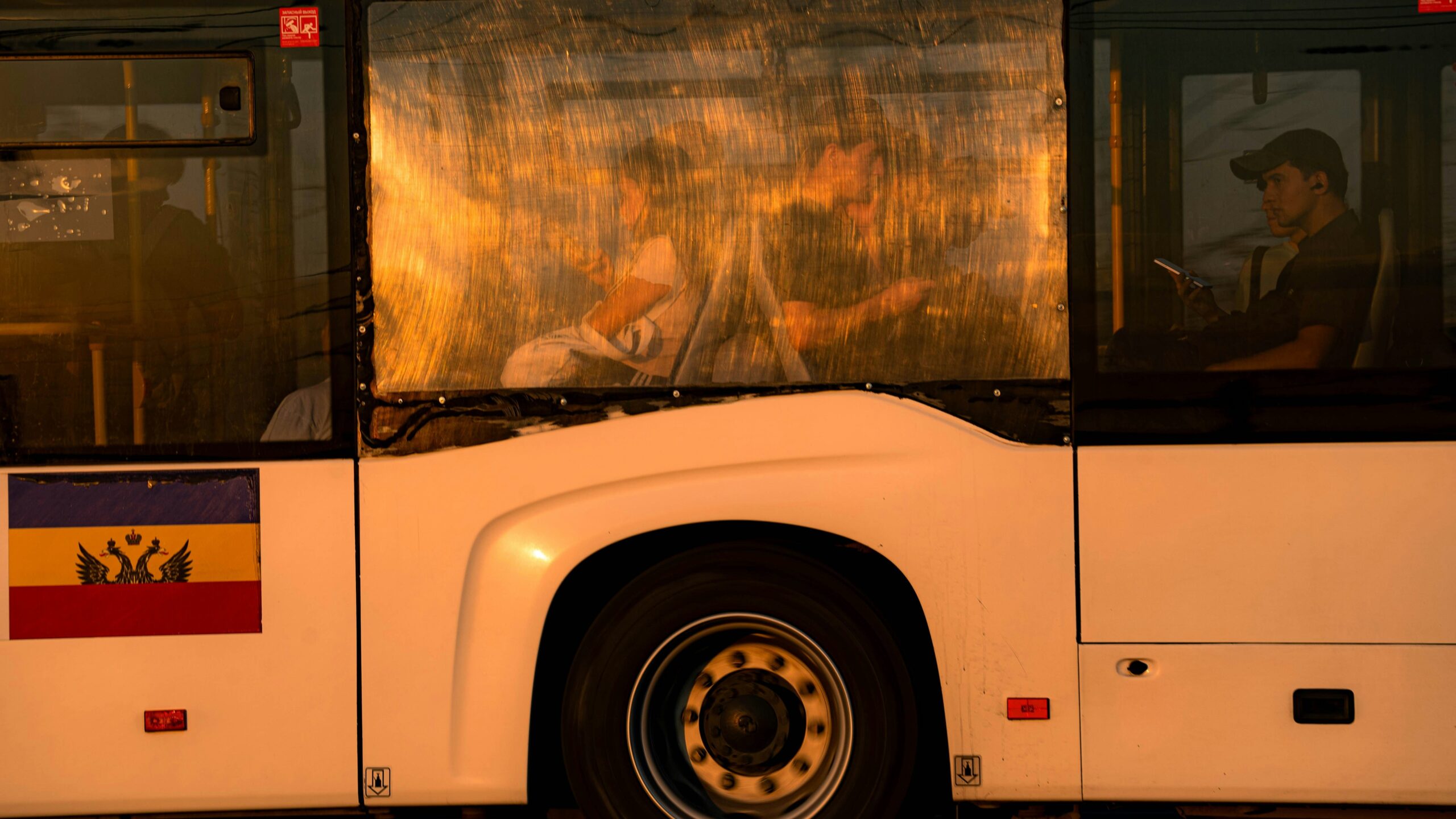 Luxury bus interior featuring comfortable seats and scenic views outside the windows