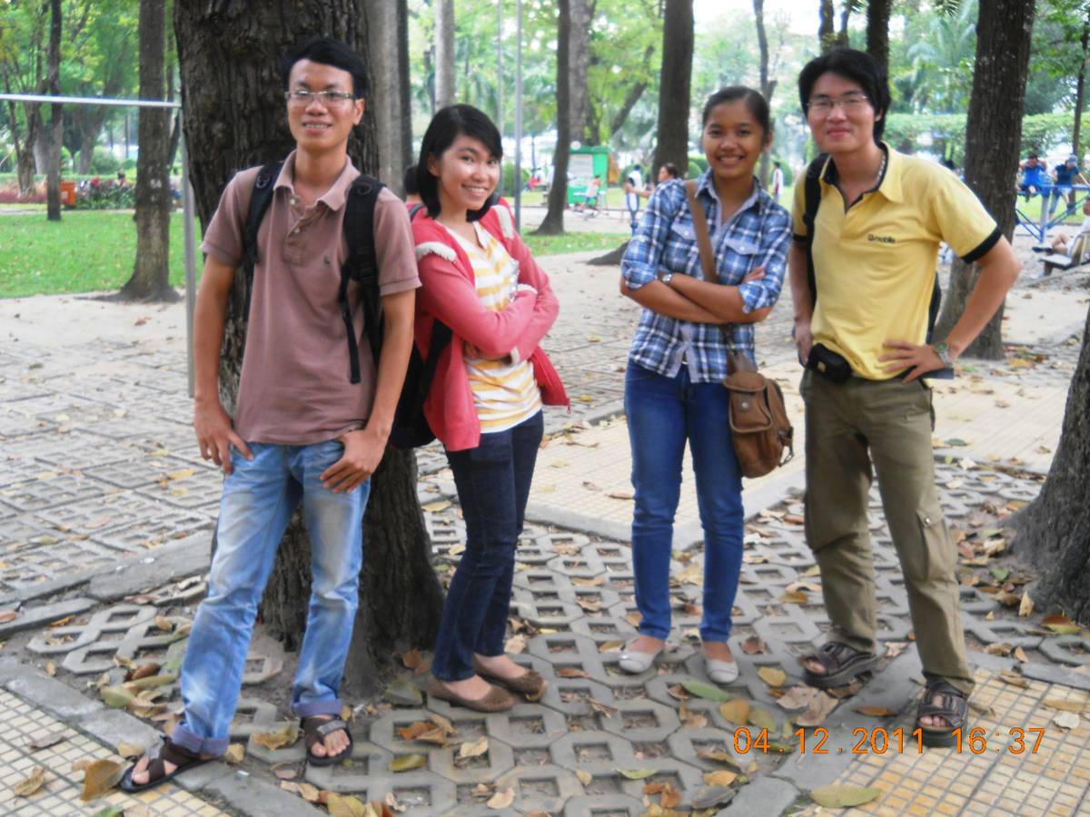 Group photo of happy tourists smiling during a luxury bus tour