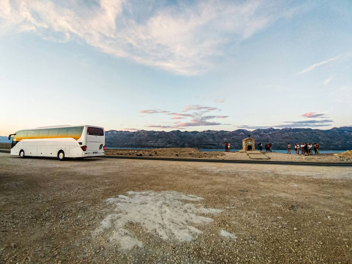 a bus parked on the side of a road