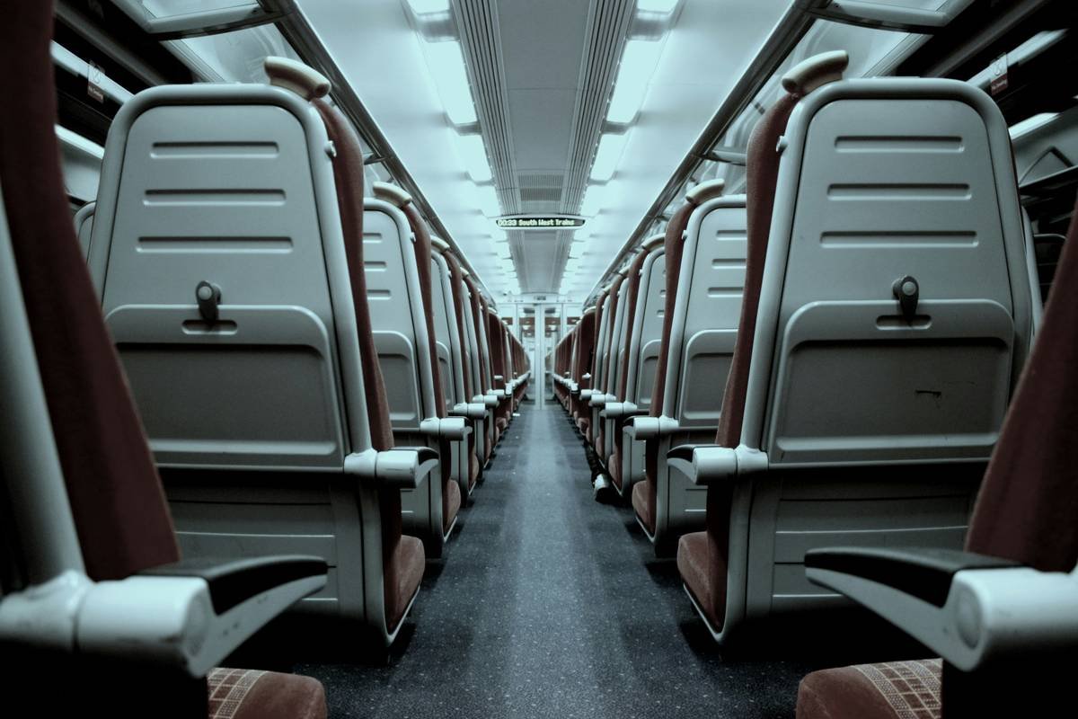 My friends and I spent the entire day in London. Now, close midnight, my friends and I were running back to the train station to take us to our hotel in Southampton. On the way up to London the train was so full it was hard to find a seat. The train was empty this time, just us on it. That allowed me to really see the symmetry of the train and I had to snap a photo of it.