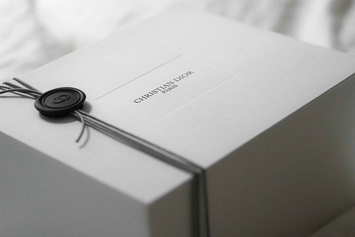 White dior gift box with black wax seal