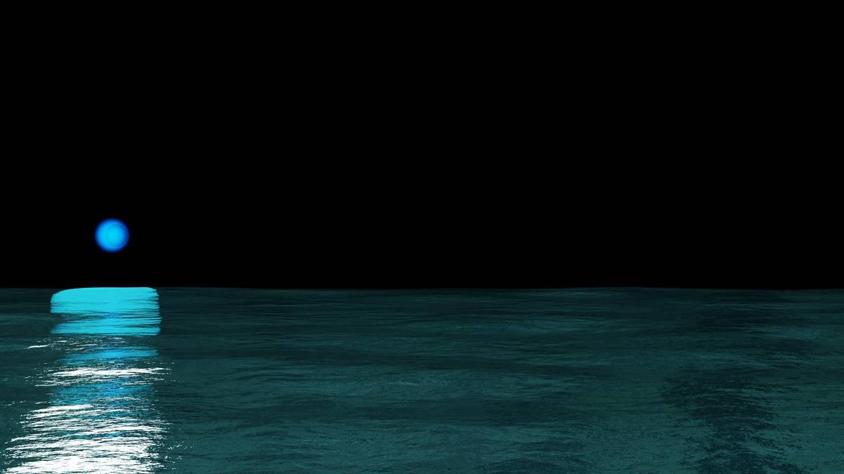 a blue ball floating on top of a body of water