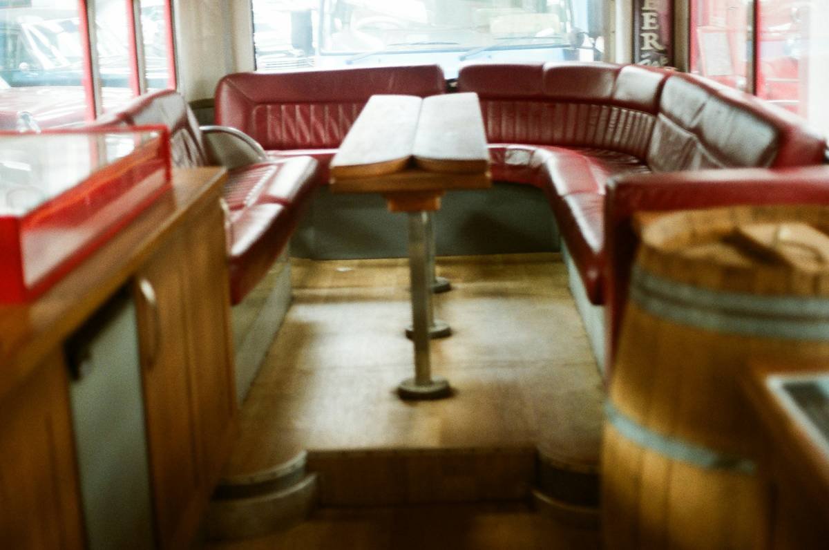 1892 Wayne Works 'Kid Hack' horse-drawn school wagon with bench seats and canvas top