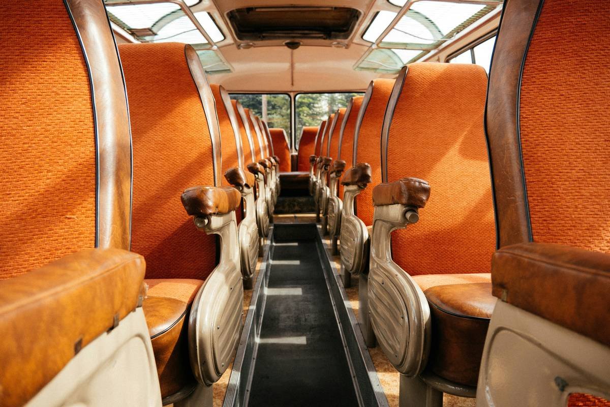 exterior view of premium coach luxury bus tour rental parked at scenic overlook