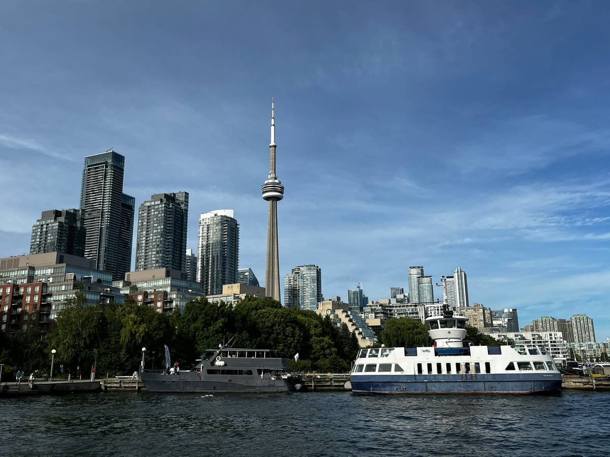Premium coach luxury bus tour toronto featuring leather seats, panoramic windows, and onboard restroom